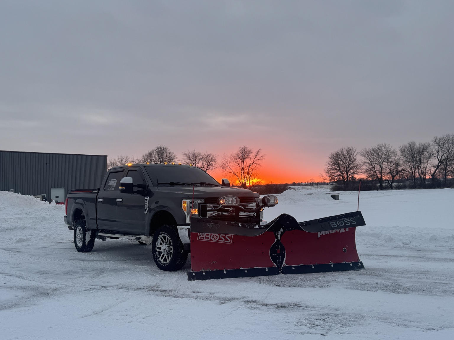 Precision Grounds Co. snow plow truck
